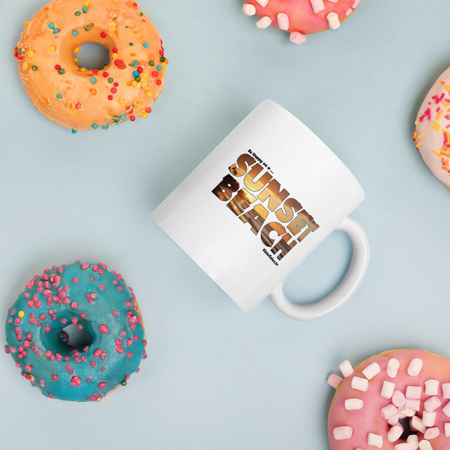 "Be Happy on a SUNSET BEACH" White glossy mug. Designed by Victor Solace.